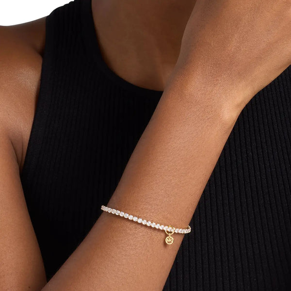 Michael Kors Ladies Brilliance Stone Set Gold Toned Stretch Bracelet
