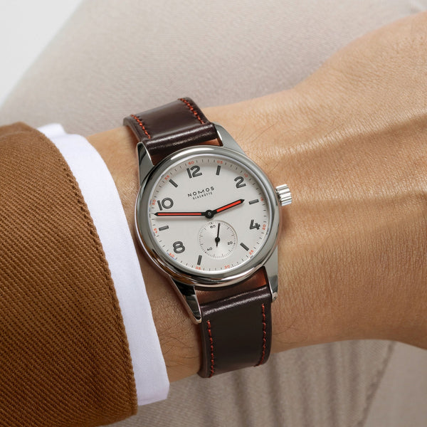NOMOS Glashütte Club Hand Wound 36mm Brown Leather Watch | Exhibition Caseback