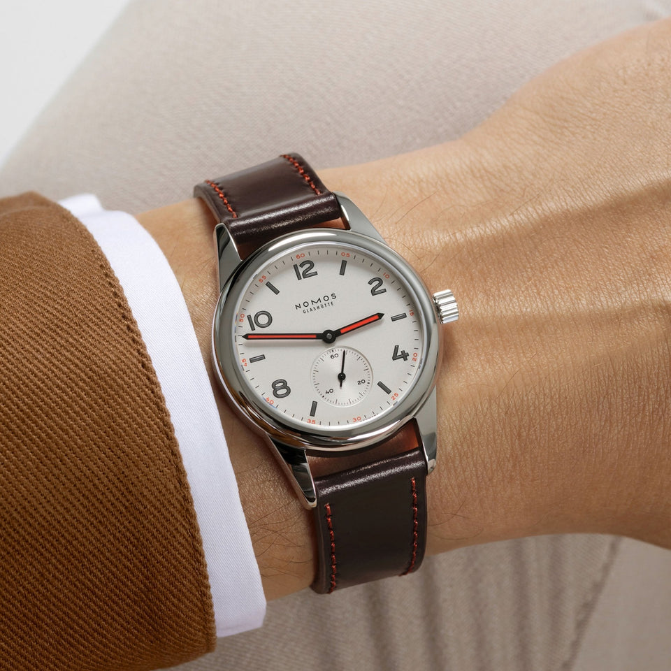 NOMOS Glashütte Club Hand Wound 36mm Brown Leather Watch | Exhibition Caseback