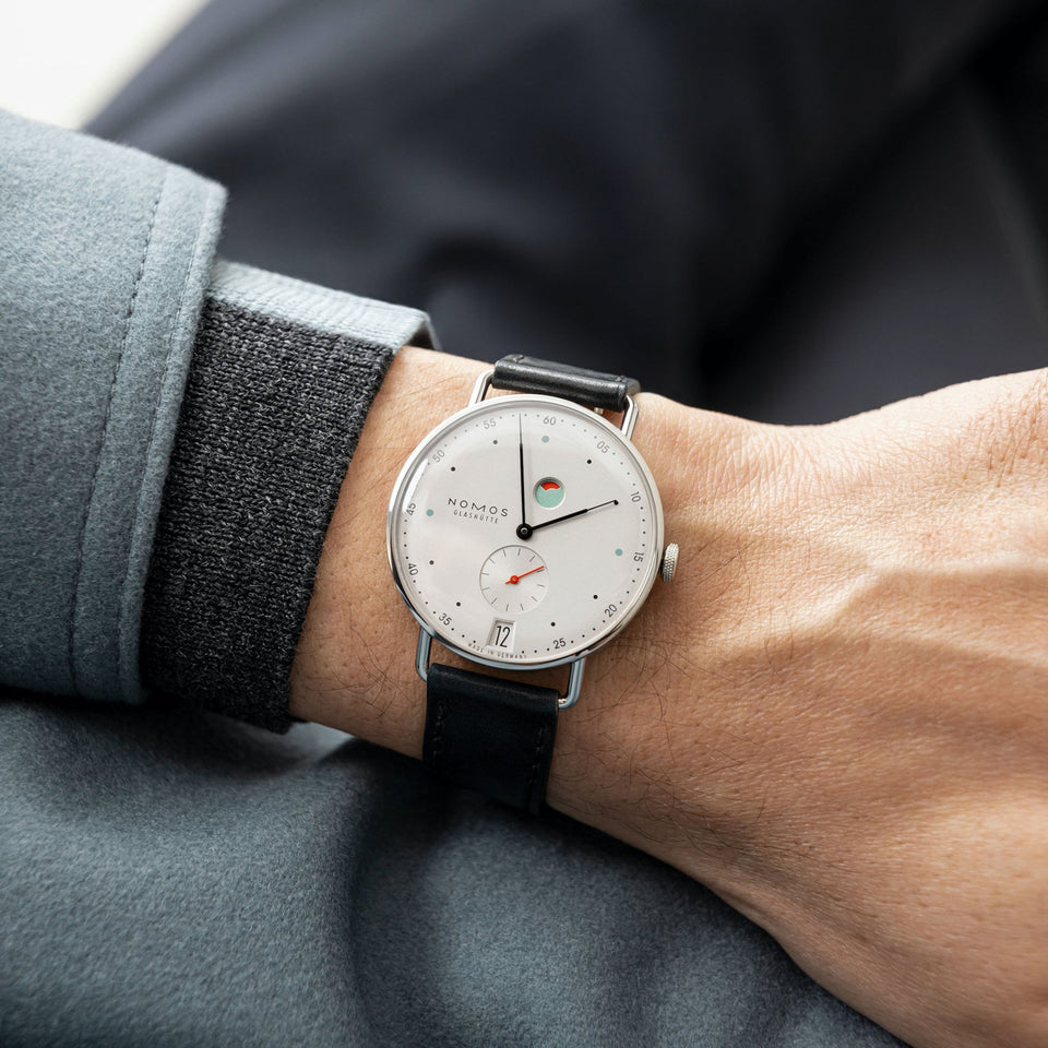 NOMOS Glashütte Metro Date Power Reserve White Dial 37mm Hand Wound Watch | Exhibition Caseback