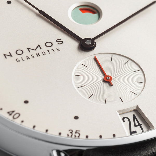 NOMOS Glashütte Metro Date Power Reserve White Dial 37mm Hand Wound Watch | Exhibition Caseback