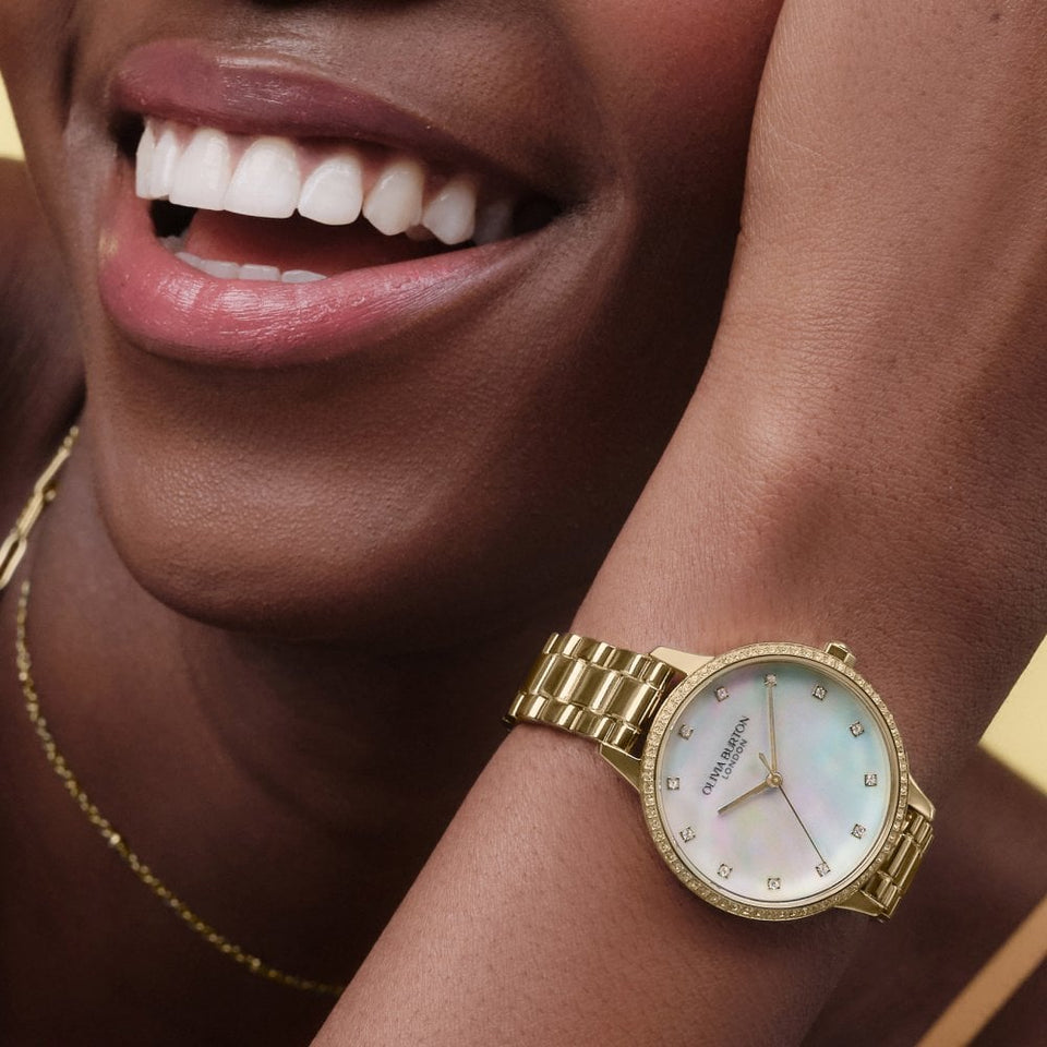 Olivia Burton Ladies Captivate Mother Of Pearl Gold Tone Watch